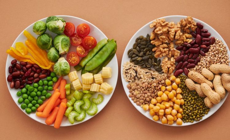 A vibrant flatlay of colorful vegetables and nuts showcasing a balanced diet concept.