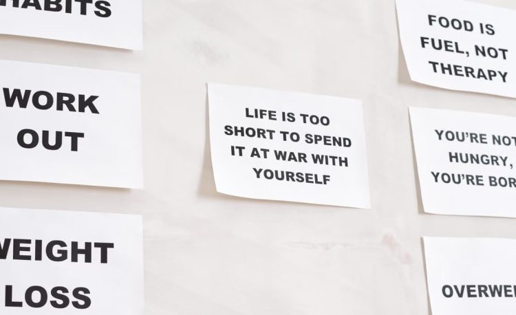 Motivational quotes on white paper promoting healthy habits and lifestyle changes.